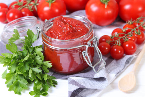 Tomato paste on the table top view. Tomato sauce. High quality photo